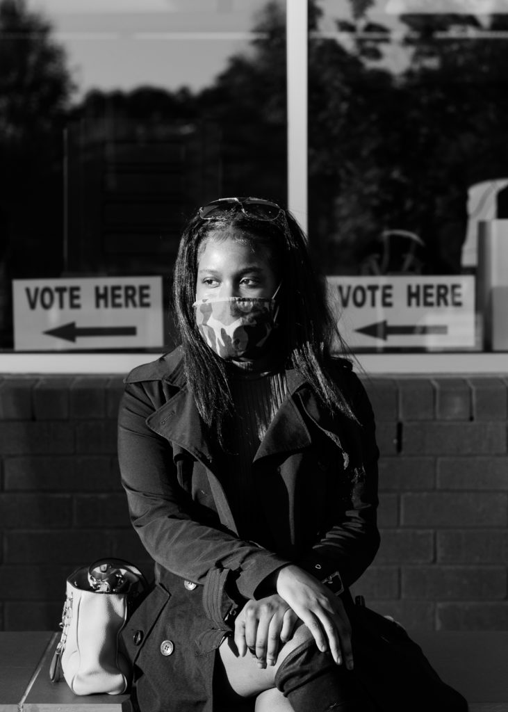2020_1103_BrianiWeeks_Durham_CAW_3 “I had a couple of strong feelings about voting. First of all, I was really, really excited to be able to participate in something so historical, especially at this time right now in our nation. I kind of felt privileged, some of my ancestors were not able to have this right or this privilege. So it kind of gave me some butterflies and I'm happy that I'm able to participate today. Considering COVID right now, the state of our finances, our country, our president, and how he views minorities in general, I just don't think that our current president would be the best fit for the future of minorities across the nation. So that kind of is something that really made me feel like in order to protect future generations I had to participate today.”